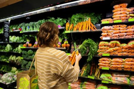 compressed-free-photo-of-back-view-groceryof-woman-choosing-carrots-at-supermarket.jpeg